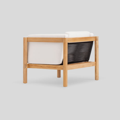 A studio photo of Haven Chair Sunbrella Canvas / Cushion Arm