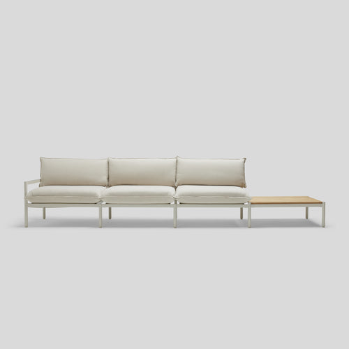 A studio photo of Terra Sofa with End Table Putty / Table